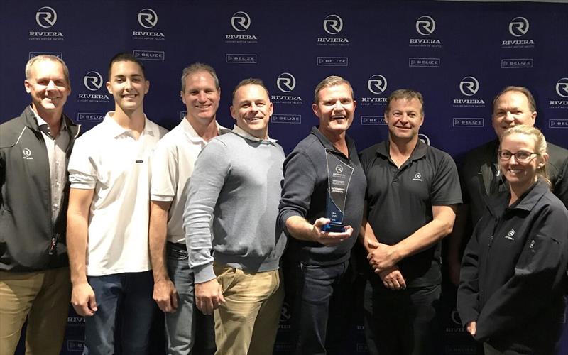 R Marine Jones principal Randall Jones (centre) accepts the Outstanding Individual award on behalf of team member Ben Croft photo copyright Riviera Australia taken at  and featuring the Marine Industry class