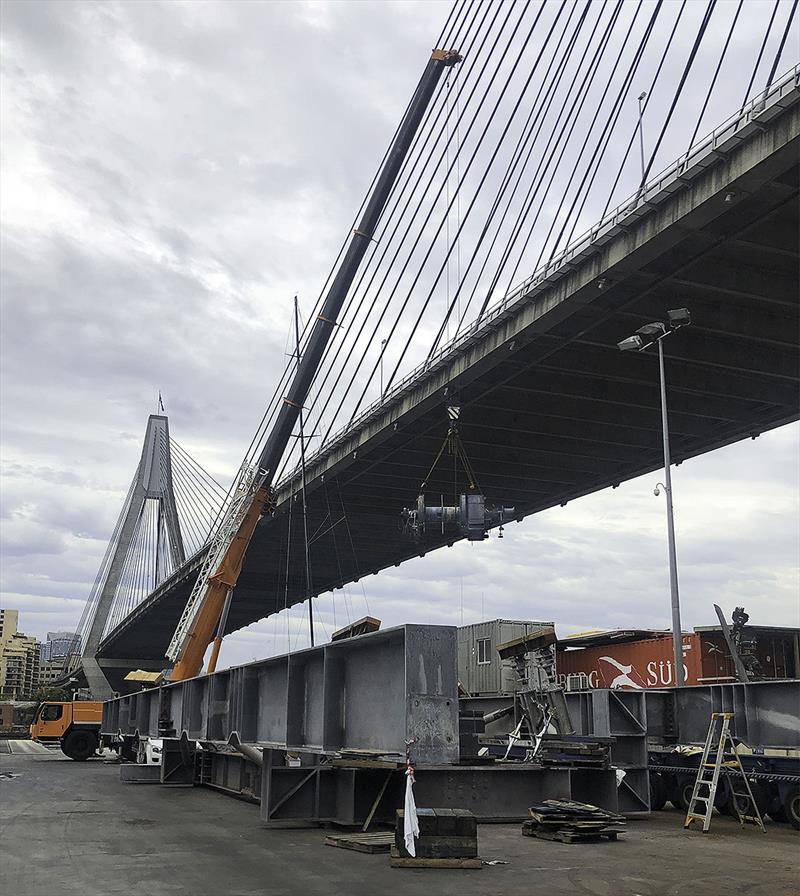 Massive tugboat winch 'flying' through the sky under the Anzac Bridge. - photo © SCM