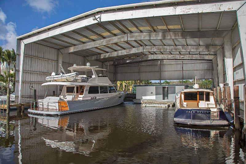 Grand Banks 60 and Palm Beach 50 in Stuart FL photo copyright Billy Black taken at  and featuring the Marine Industry class