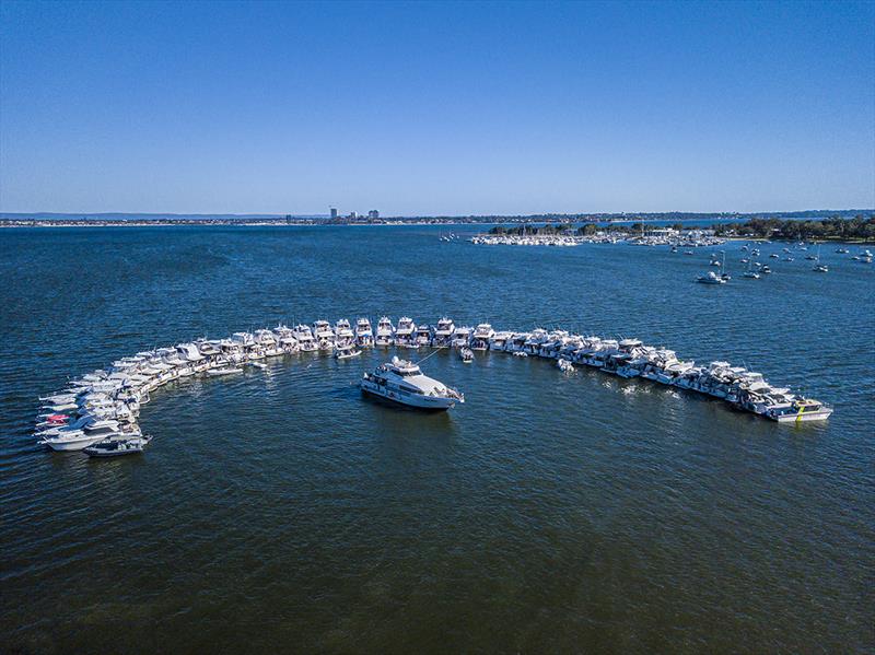 The Riviera Family in Perth celebrate as 45 motor yachts raft-up on the Swan River photo copyright Riviera Australia taken at  and featuring the Marine Industry class