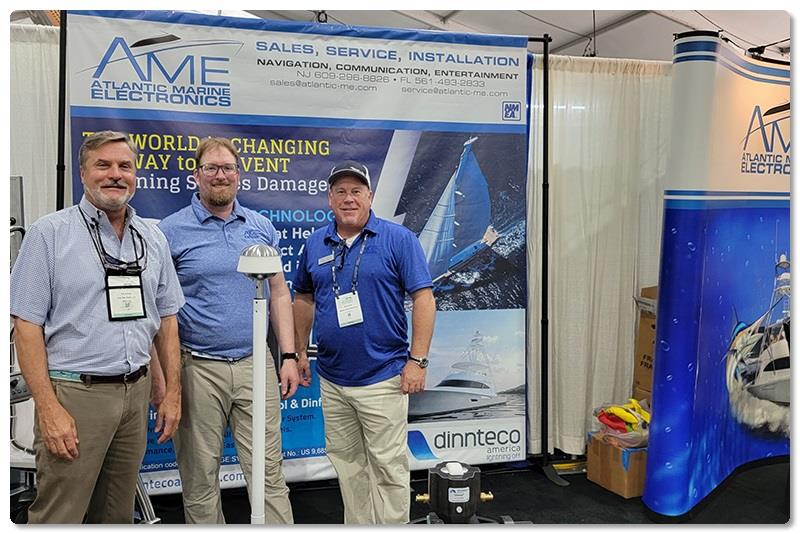 Vice President of ComMar Ken Smaga (left) and AME Operations Manager Bill Cunane (right) are pictured with Todd at AME's Palm Beach Show display that features the Dinnteco product. photo copyright Viking Yachts taken at  and featuring the Marine Industry class