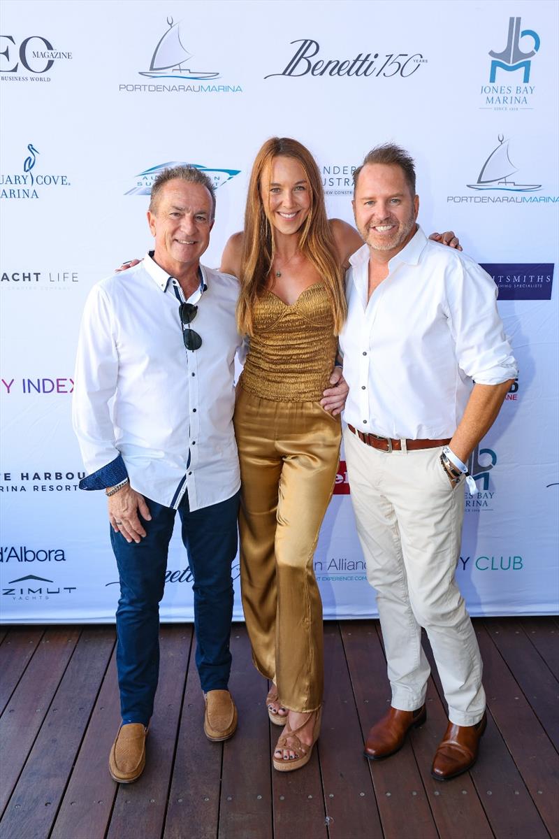 (l-r) Steve Sammes & Francesca Ruby from Sanctuary Cove Marina with Jason Roberts, Aurora Logistics photo copyright Salty Dingo taken at  and featuring the Marine Industry class