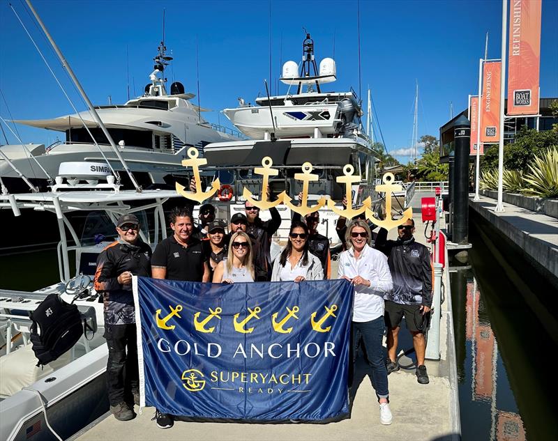 The Boat Works team being presented their flag - photo © Marina Industries Association