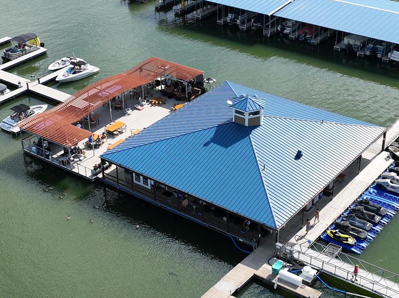 Marine Development Inc. designed, manufactured and installed a new floating patio, fuel dock and courtesy dock with slips for Clinton Lake Marina - photo © Marine Development Inc.