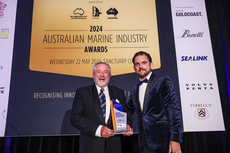 Andrew Hutchinson, Senior Economic Development Officer, City of Gold Coast presents the 2024 Australian Marine Industry Innovation of the Year to Alan Steber from Steber International - photo © Salty Dingo