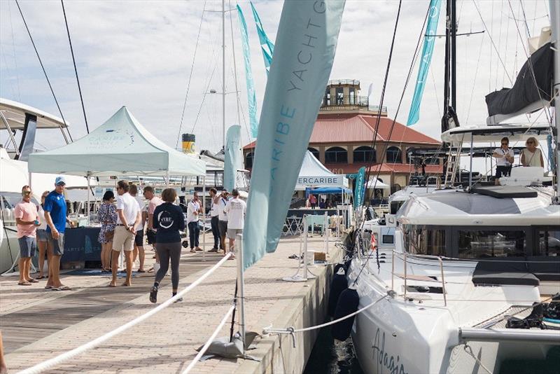 Yacht on show at VIBE 2024 with Harbor 360 Building in the background at IGY's Yacht Haven Grande St Thomas photo copyright Savanah Willow taken at  and featuring the Marine Industry class