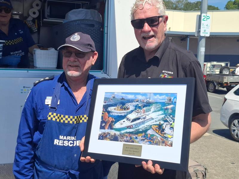 Marine Rescue Port Macquarie Unit Commander Greg Davies and Tim Walker - Community Development Manager Ritchies IGA - photo © Marine Rescue NSW