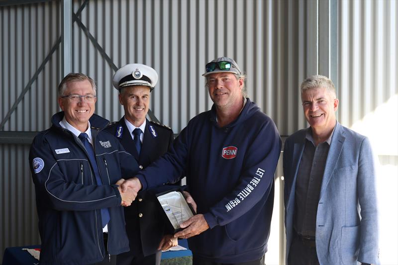 Josh from Buckenderra Holiday Village recieves a momento for supporting the project - photo © Marine Rescue NSW 