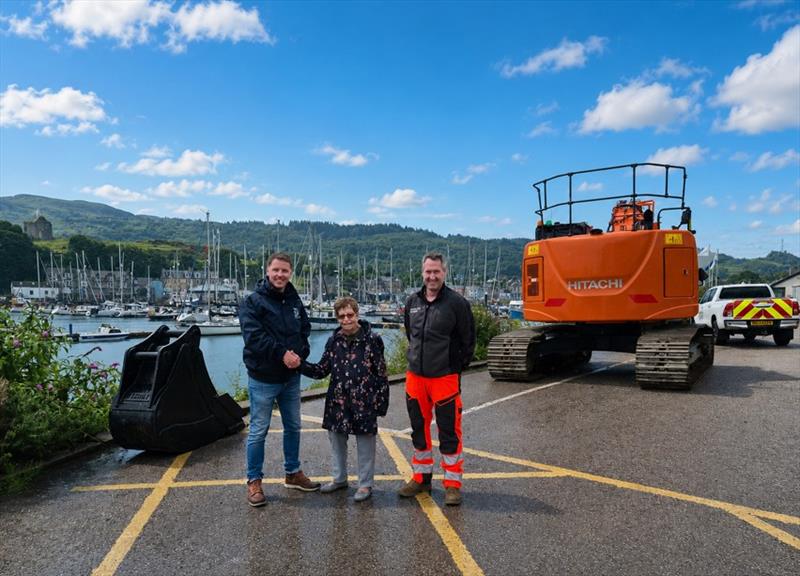 Darren Mair (Senior Port Manager / Harbour Master) of THA, Anne Horn (Councillor – Kintyre and The Islands) and Mark Montgomery (Senior Site Engineer) of Charles Brand photo copyright Tarbert Harbour taken at  and featuring the Marine Industry class