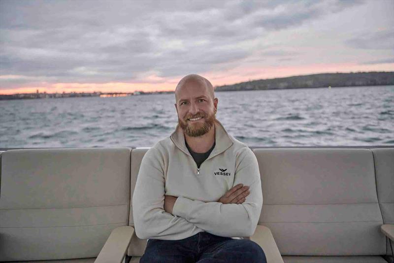 Vessev co-founder and CEO, Eric Laakmann, aboard Vessev's VS–9 electric hydrofoiling passenger vessel photo copyright Derek Henderson taken at  and featuring the Marine Industry class