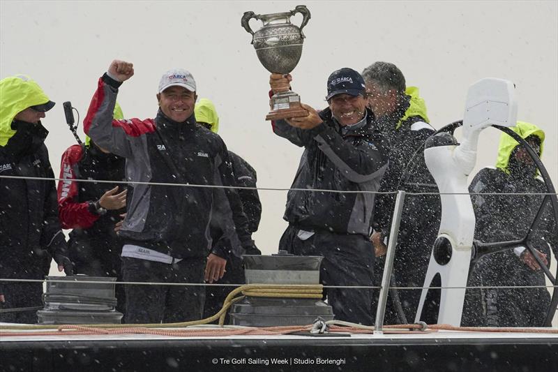 ARCA SGR's Furio Benussi with his line honours trophy and left his talented Trieste tactician Lorenzo Bressani - photo © Tre Golfi Sailing Week / Studio Borlenghi