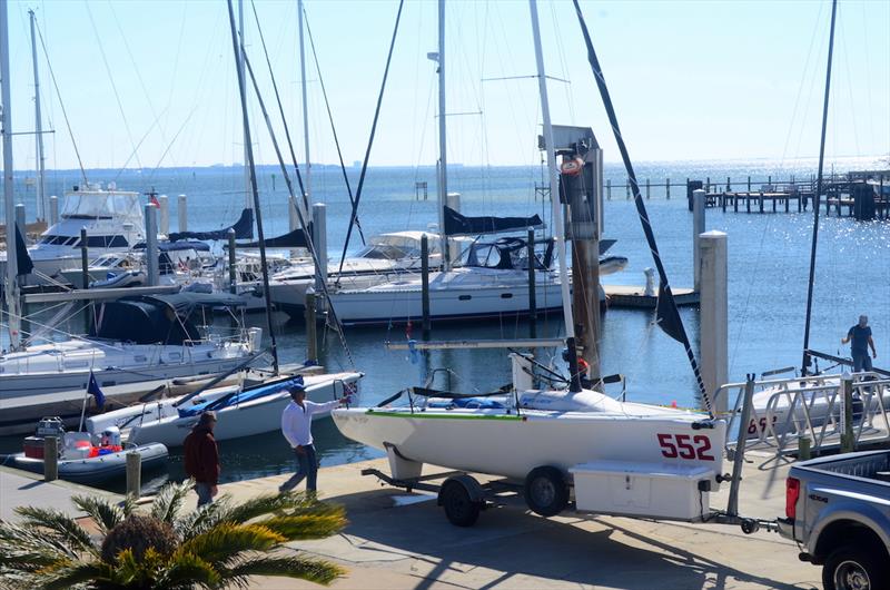 The Pensacola Bay racing area is just minutes from the Pensacola Yacht Club marina. Mike Spurgeon and crew prep Comin' Hot for splashdown for Friday's paracice at the 2019 Melges 24 Bushwhacker Cup photo copyright Talbot Wilson taken at Pensacola Yacht Club and featuring the Melges 24 class