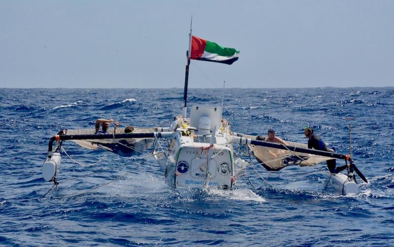 The crew of Row4Ocean attach a tow line to support vessel Supertramp for the final 750nm photo copyright Row4Ocean taken at 