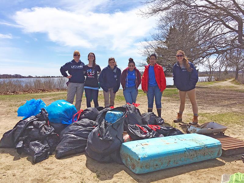 Volunteers remove marine debris from the shoreline photo copyright Mystic Aquarium taken at 