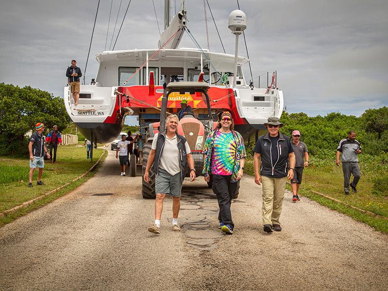 Johnny Paarman [L] and Roger Paarman [R] walk with the proud new owner of the Balance 526 `Vingilote` as they prepare for the splash photo copyright Balance Catamarans taken at 