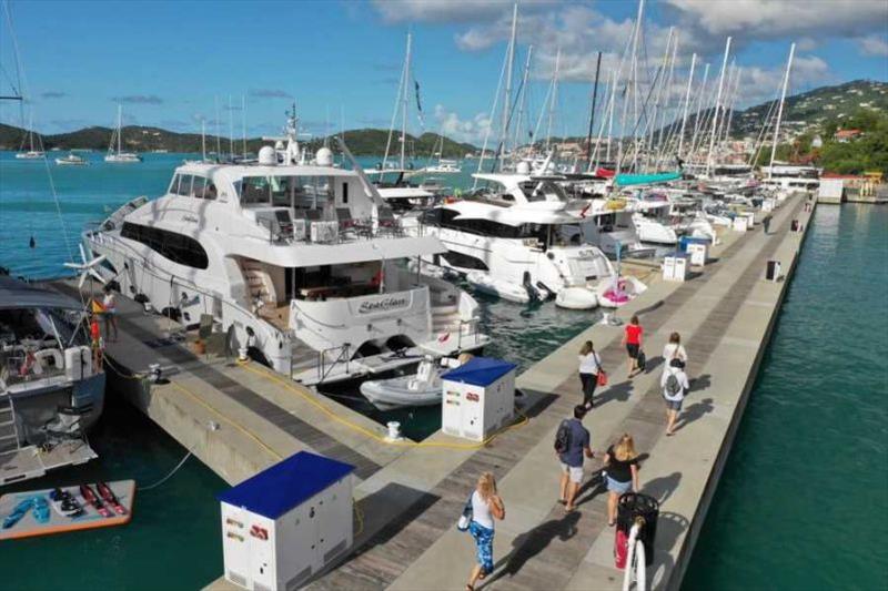 A few of the 140 charter yacht brokers attending the 2019 USVI Charter Yacht Show walk the docks at IGY's Yacht Haven Grande. - photo © Phil Blake