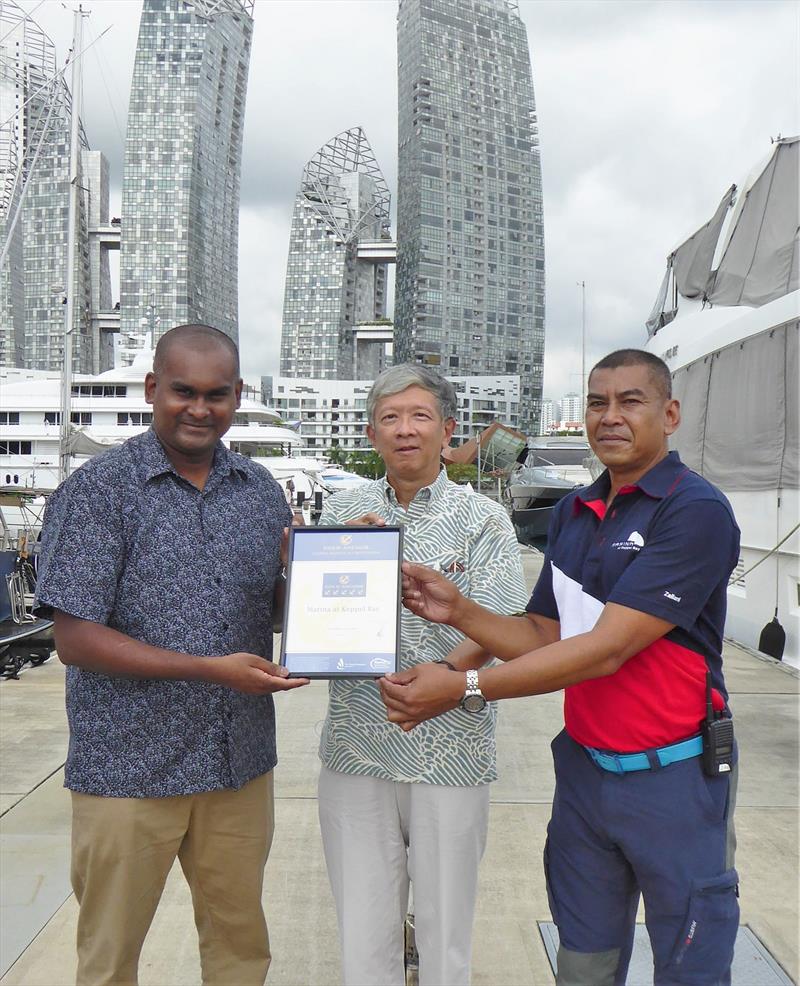 YP Loke (centre), Chairman of the Singapore Boating Industry Association, presenting the 5 Gold Anchor certificate to Selvaraj Arivananthan (left), Marina Manager at Marina at Keppel Bay, and Zailani Mahlan, Marina Supervisor at Marina at Keppel Bay photo copyright Marina Industries Association taken at 
