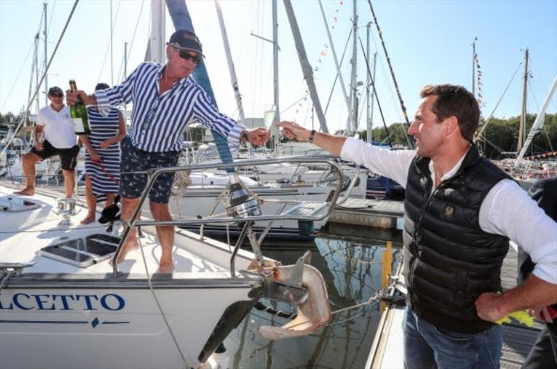 Berth holder gives Sir Ben Ainslie champagne - photo © Buckler's Hard Yacht Harbour