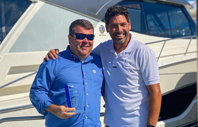 Ned Dozier (left), of OneWater Yacht Group, is presented with the Sales Excellence by an Individual Award by Riviera's Chris McCafferty. - photo © Riviera Australia