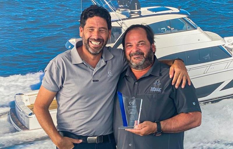 Javier Borras (right) accepts the Service Excellence by a Dealership Award on behalf of his team at Wally Castro Marine, presented by Riviera's Chris McCafferty. - photo © Riviera Australia