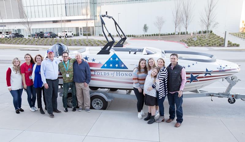 L-R Meredith Allen & Sarah Duncan, Folds of Honor; Connie and Mike VanCampen, boat winners; Johnny Powers, Suntex Founder; Bill Anderson, President of Westrec Marinas; Cole & Lisa Young, Mr. VanCampen's daughter & son-in-law and children Lily, Cate & Anna photo copyright Suntex Marinas taken at 