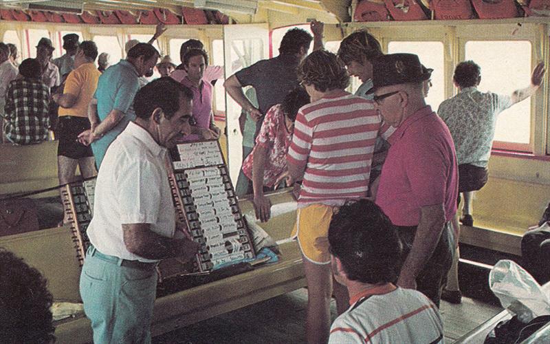 An individual bookmaker on a small ferry in the 70s photo copyright Archive taken at Australian 18 Footers League