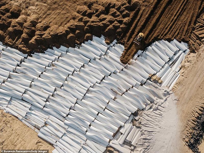 At the Casper landfill (USA), at least 870 blades are piled up in 30-foot-deep holes for burial photo copyright RCA Engineering taken at 