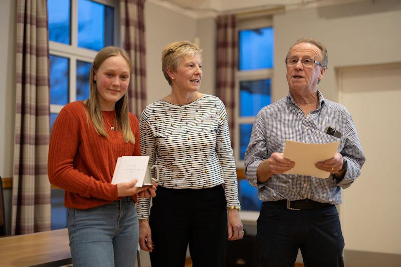 Solway Yacht Club annual Prize Giving: Tamsin Wallace, winner with her crew, Keiran Ganeri, of the Heather Dodds Sportsmanship Trophy having shown outstanding good sportsmanship during Cadet week, presented by Liz Train (centre) with Scott Train - photo © Nicola McColm