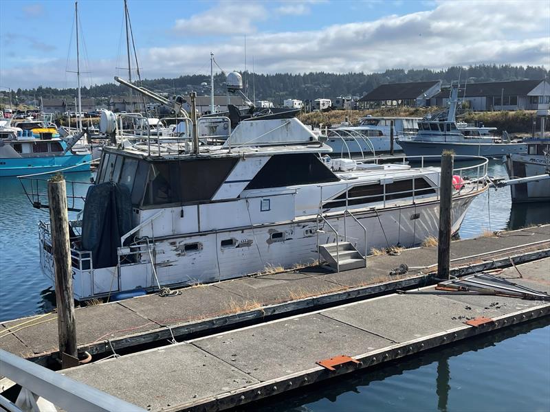 An abandoned derelict vessel at imminent risk of sinking at the Port of Newport, Oregon, will be removed under a groundbreaking removal program - photo © Dorothy Diehl, Oregon Dept. of State Lands