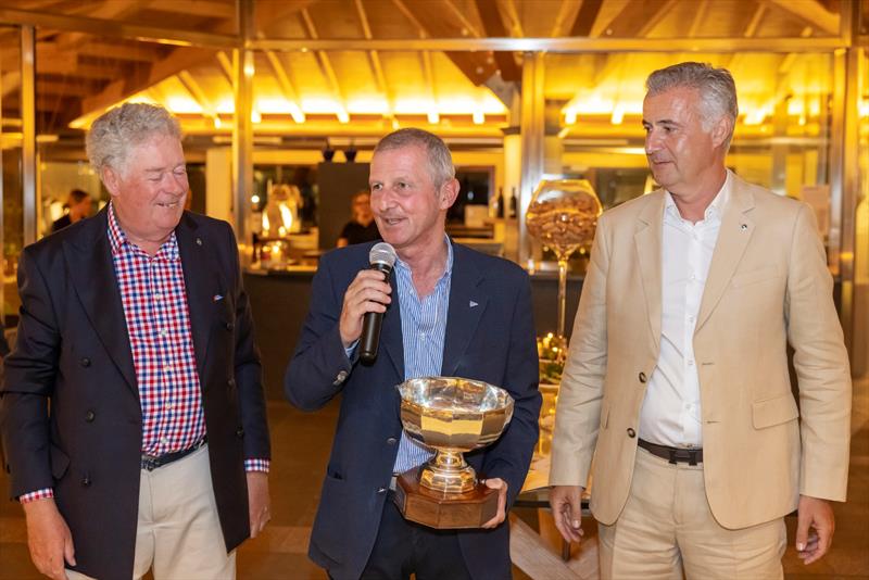 The IMA's Andrew McIrvine and Benoît de Froidmont present the Gianfranco Alberini Challenge Trophy to worthy recipient, Edoardo Recchi, the YCCS' out-going Secretary General and Sports Director - photo © IMA / Studio Borlenghi 