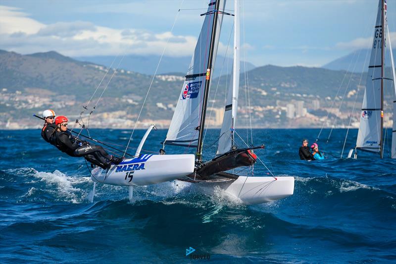 Sam Cox & Sophie Raven (GBR) sailing upwind on Day 2 of the Nacra 15 European Super Series event in Barcelona photo copyright Óscar Torveo / Barcelona International Sailing Centre taken at Barcelona International Sailing Center and featuring the Nacra 15 class
