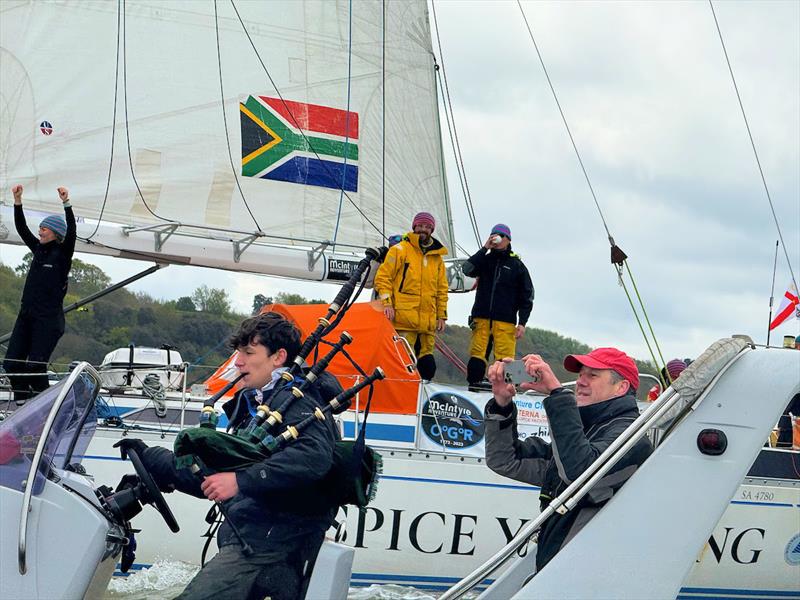 Two boats both with Bagpipes pushing out the South African National anthem to an emotional and excited crew of Sterna photo copyright Aïda Valceanu/ OGR2023 taken at Royal Yacht Squadron and featuring the Ocean Globe Race class