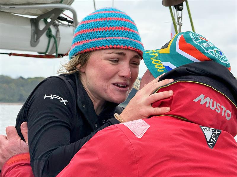 Aurora, the youngest crew member who helmed STERNA across the finish line, meets her dad for the first time in a couple months!! photo copyright Aïda Valceanu/ OGR2023 taken at Royal Yacht Squadron and featuring the Ocean Globe Race class