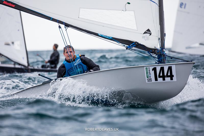 OK Dinghy Worlds Day 5 - Richard Burton, GBR photo copyright Robert Deaves / www.robertdeaves.uk taken at Lyme Regis Sailing Club and featuring the OK class