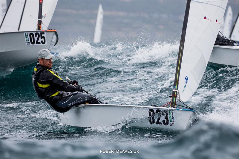 OK Dinghy Worlds Day 5 - Andrew Mills, GBR photo copyright Robert Deaves / www.robertdeaves.uk taken at Lyme Regis Sailing Club and featuring the OK class