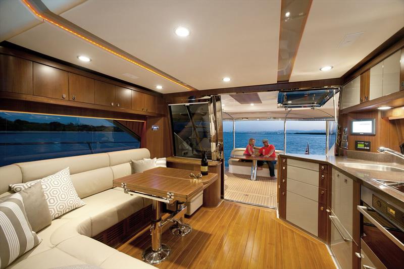 The salon of the Belize 54 Daybridge is an elegant blend of luxury and style photo copyright Riviera Studio taken at  and featuring the Power boat class