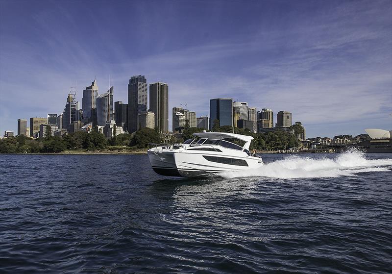 Aquila 36 Flying along Sydney Harbour photo copyright John Curnow taken at  and featuring the Power boat class