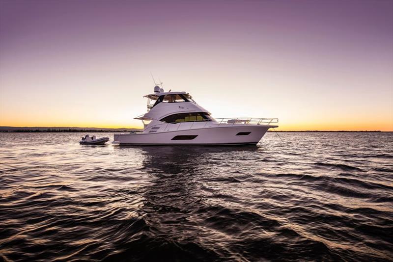 Riviera 52 Enclosed Flybridge anchored - photo © Riviera Australia