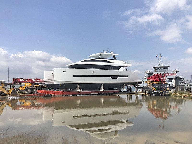 New Iliad 70 get splashed ahead of sea trials, and then unveiling to new owner and premiere at the Sydney International Boat Show photo copyright Multihull Solutions taken at  and featuring the Power boat class