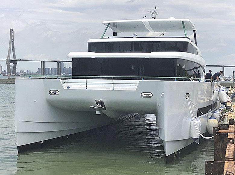 New Iliad 70 get splashed ahead of sea trials, and then unveiling to new owner and premiere at the Sydney International Boat Show  photo copyright Multihull Solutions taken at  and featuring the Power boat class