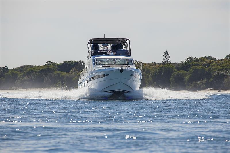 Powering along with the Longreef 60 SX photo copyright John Curnow taken at  and featuring the Power boat class