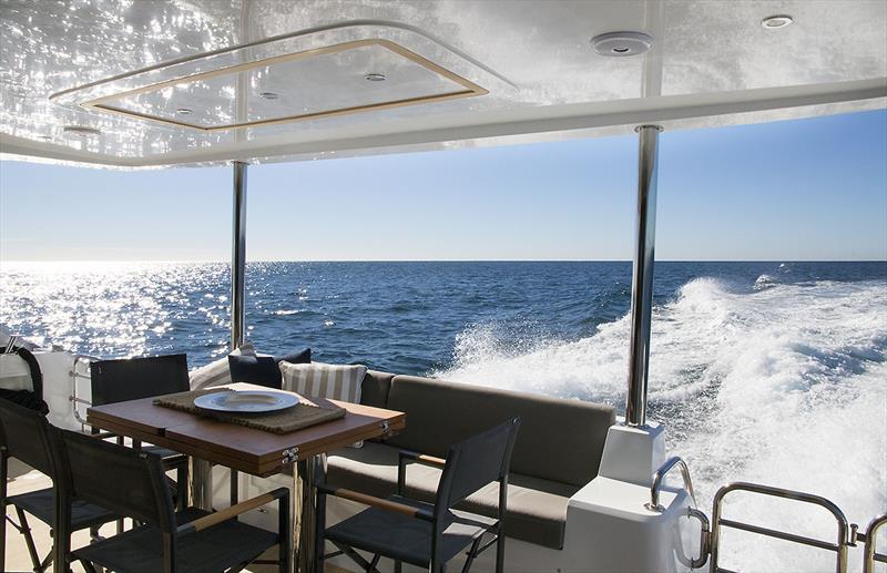 Out aft on the ILIAD 50, and it is almost within arm's reach of the galley, where there is also a breakfast bar - photo © Jennifer McKinnon