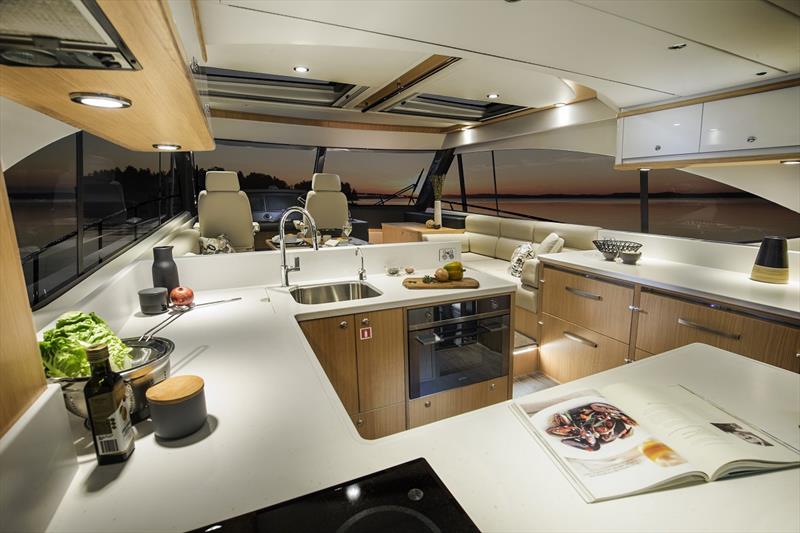 Riviera 545 SUV Saloon and Galley photo copyright Riviera Studio taken at  and featuring the Power boat class