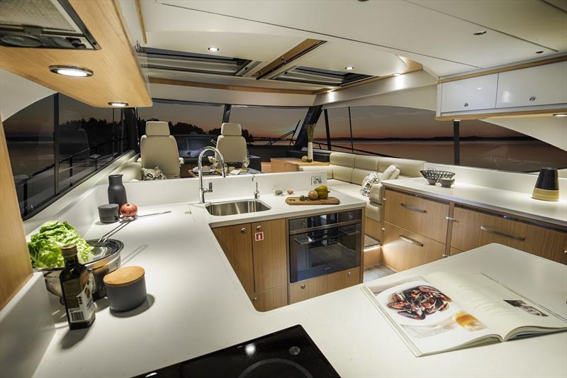 Riviera 545 SUV Saloon and Galley - photo © Riviera Studio