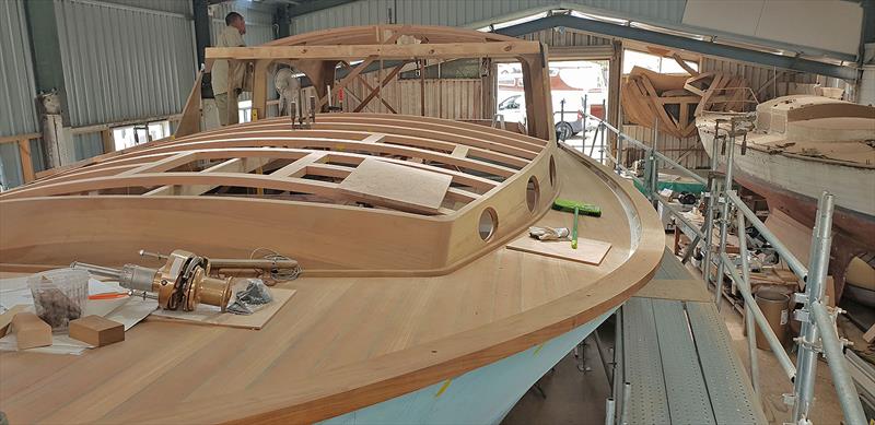 Work continues on Hull #2 of the Wooden Boat Shop's Deal Island 50 craft photo copyright Wooden Boat Shop taken at Sorrento Sailing Couta Boat Club and featuring the Power boat class