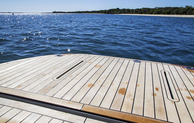 The massive swim platform has a bespoke seating arrangement to create your own wet bar. - photo © John Curnow