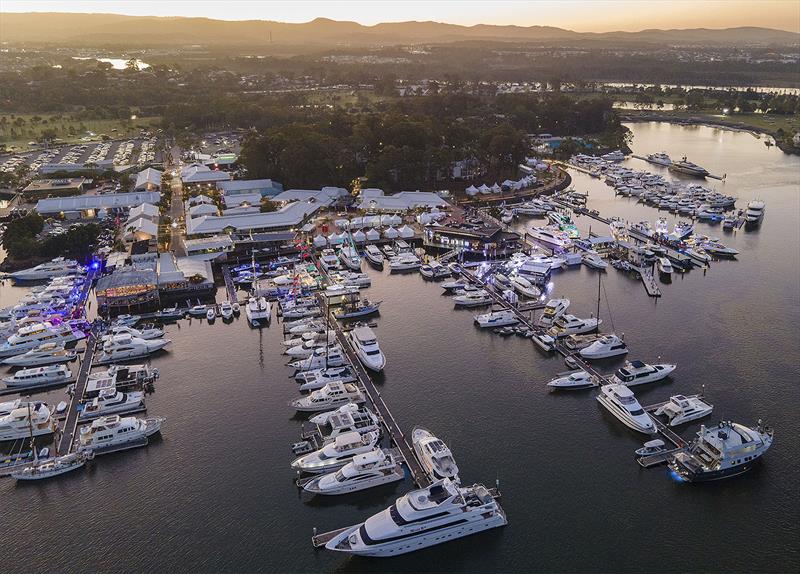 All ablaze - as the sun sets the lights come on at the Maritimo stand at the Sanctuary Cove Festival of Boating photo copyright Maritimo taken at  and featuring the Power boat class