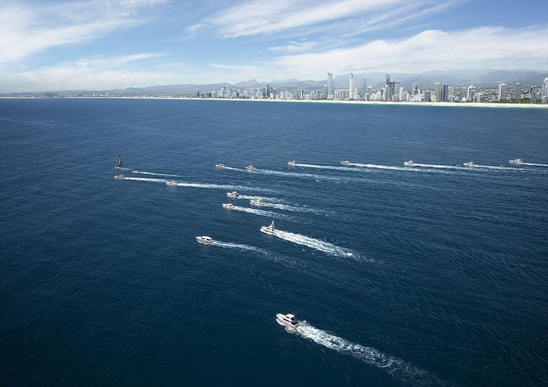 The fleet shadows USA 16 as she hoists her sails off the Gold Coast. - photo © Maritimo