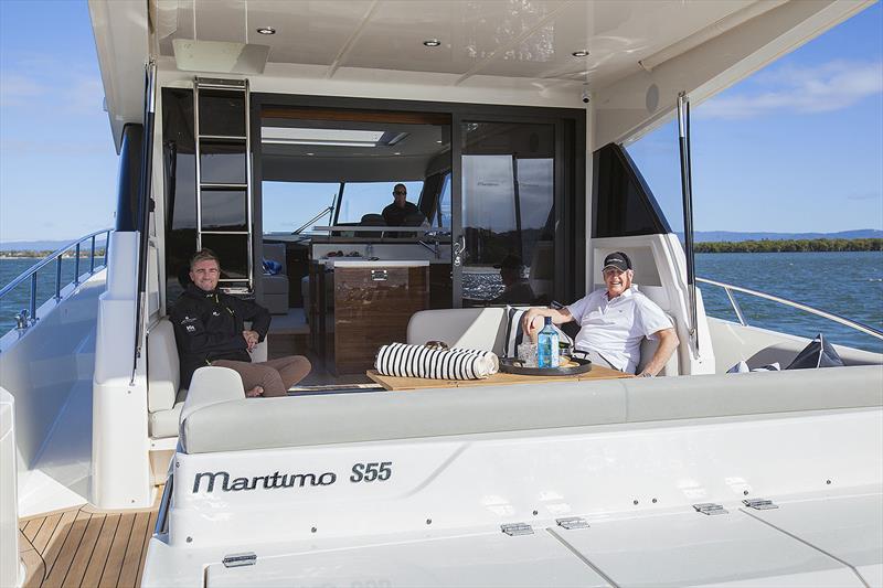 Rosco Willaton driving, as Tom Barry-Cotter and Paul Wilson demonstrate yet more of the lounging space on the Maritimo S55 photo copyright John Curnow taken at  and featuring the Power boat class
