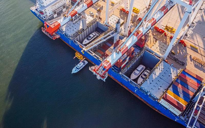 Aerial view of the Riviera motor yachts being secured aboard the transport for the ocean crossing to the US - photo © Riviera Australia